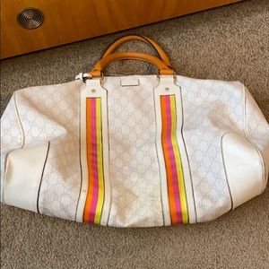 Gucci cream colored duffel bag